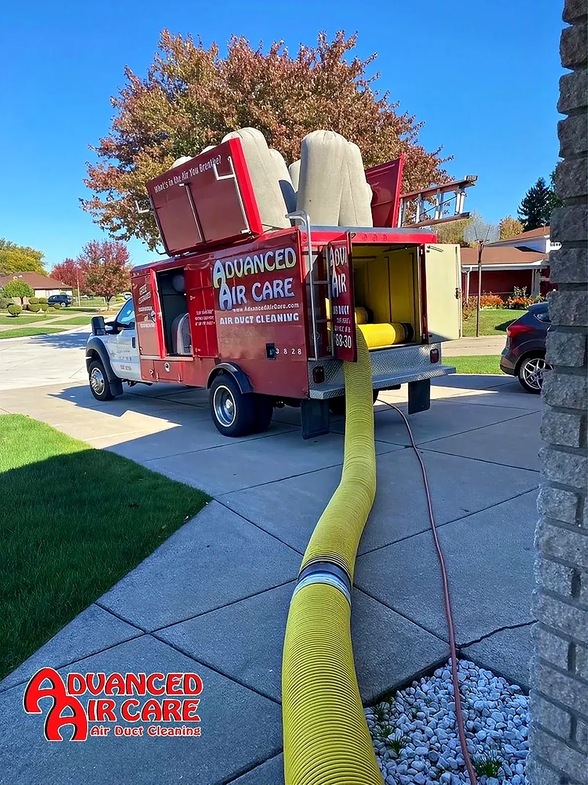 PowerVac hose run to the front door of a Macomb home